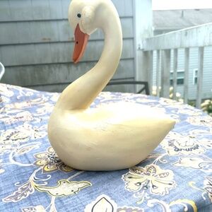 - Ike and Spillman white swan sculpture
